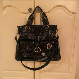 11 by 14. Elliot Luca Black patent leather gold hardware., excellent condition